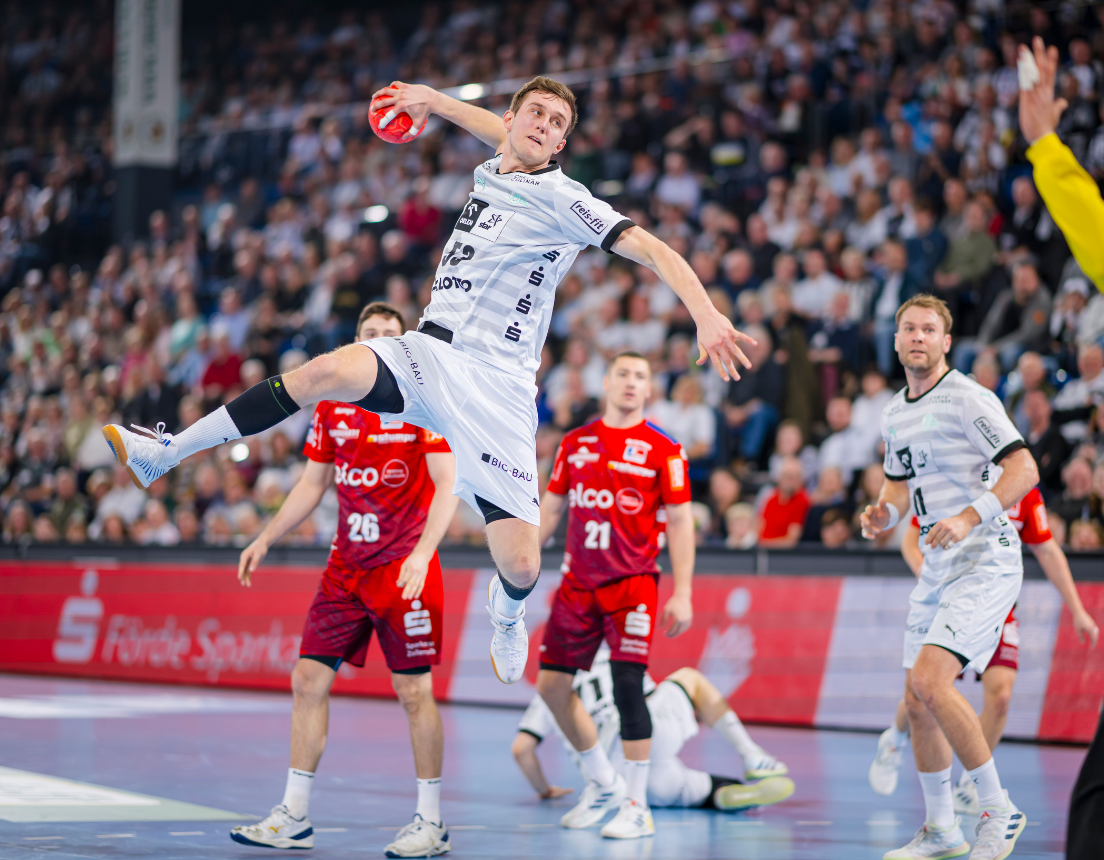 THW Kiel player attempts a jump shot.