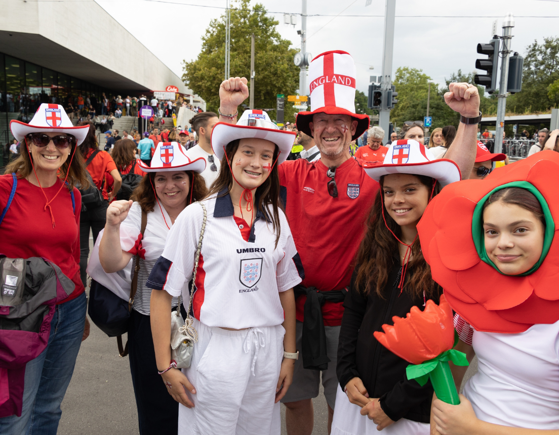 England fans posing for a picture at the Women's UEGA Euro 2025 tournament.