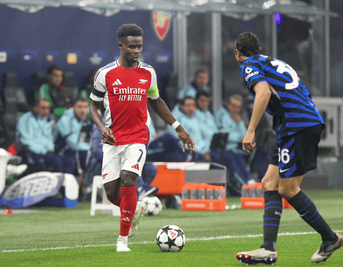 Bukayo Saka (Arsenal FC) dribbles in front court in the second half during soccer game FC Inter vs Arsenal FC,