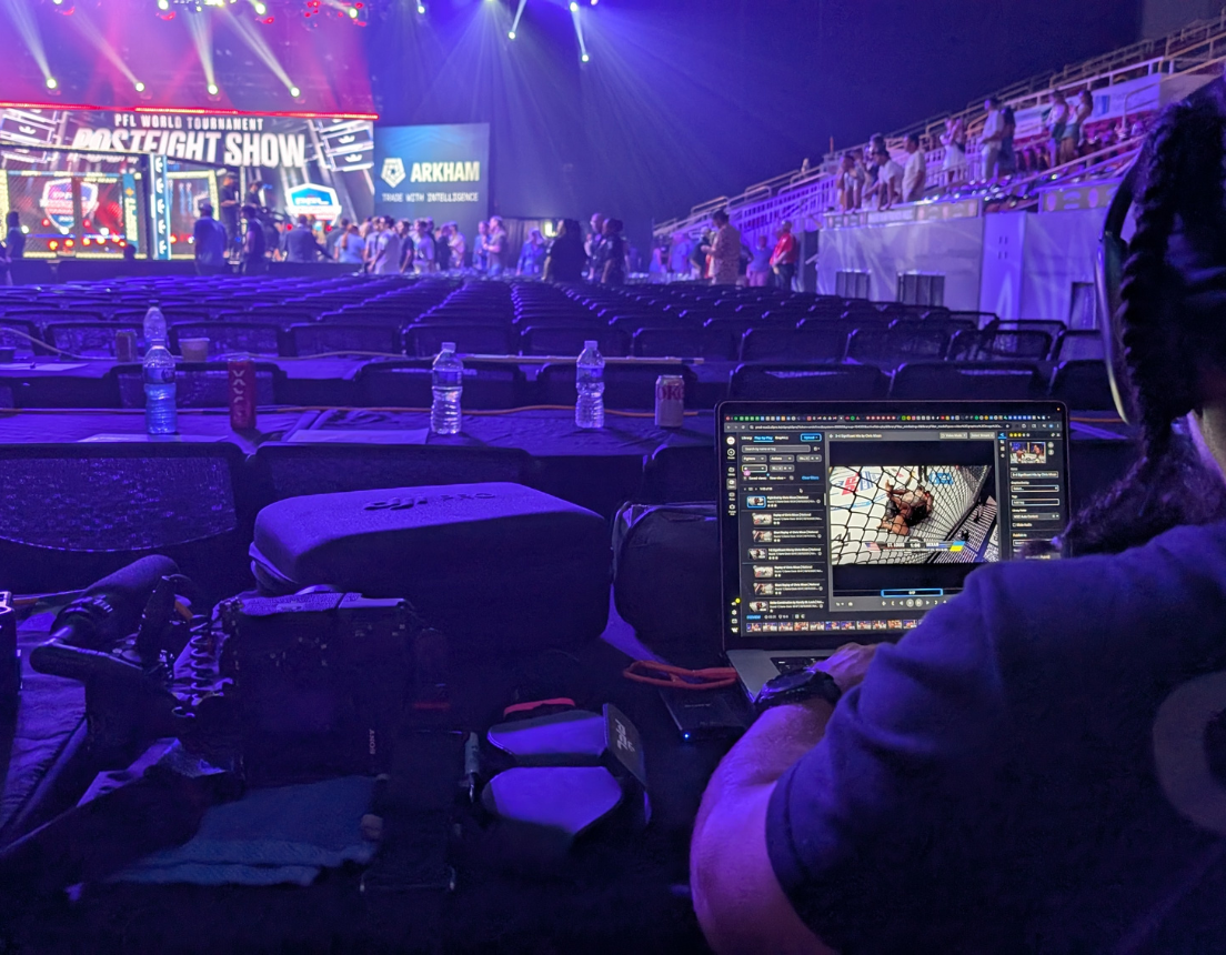 Employee using comptuer vision based program to create content from PFL match.