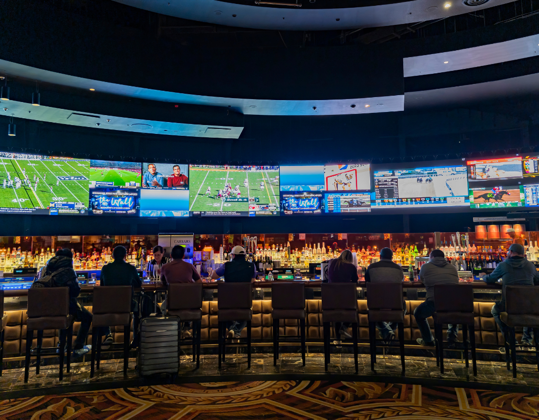 Fans in sports bar watch a variety of sporting events.