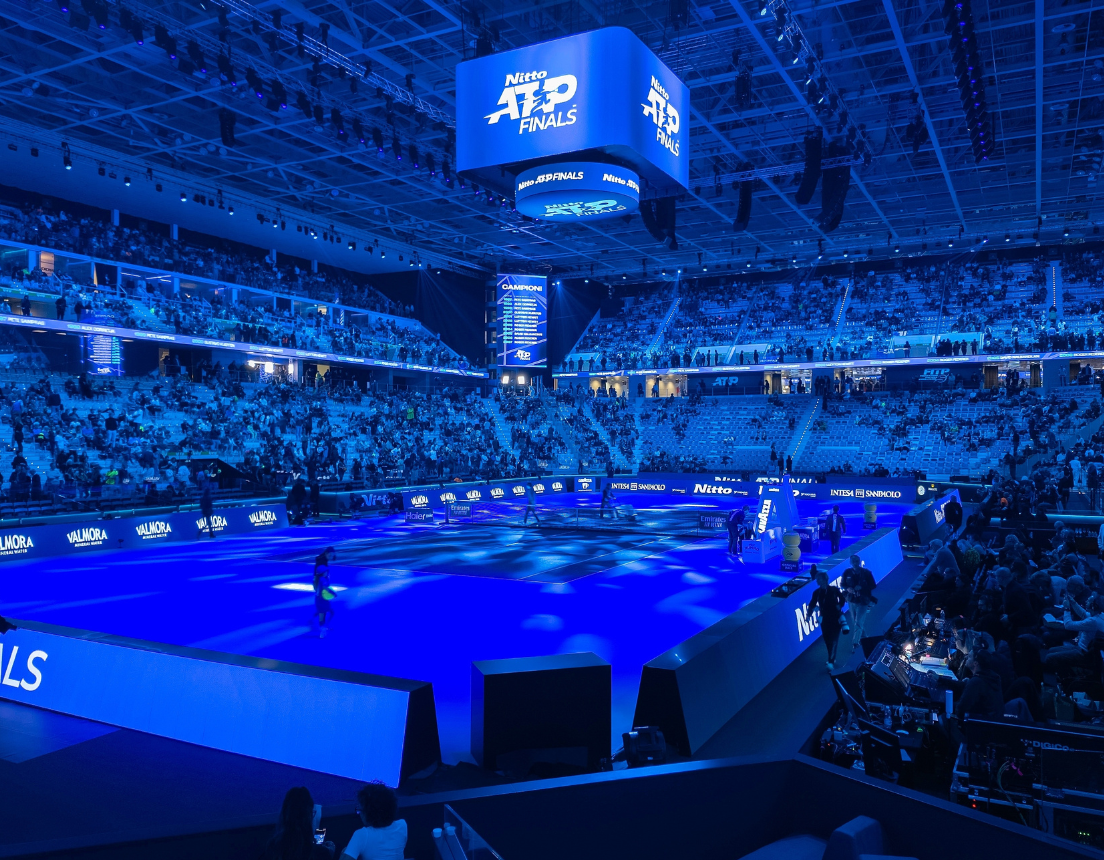 Wide shot of the blue illuminated Inalpi Arena Stadium during the Nitto ATP Finals tournament of tennis in Turin, Italy.