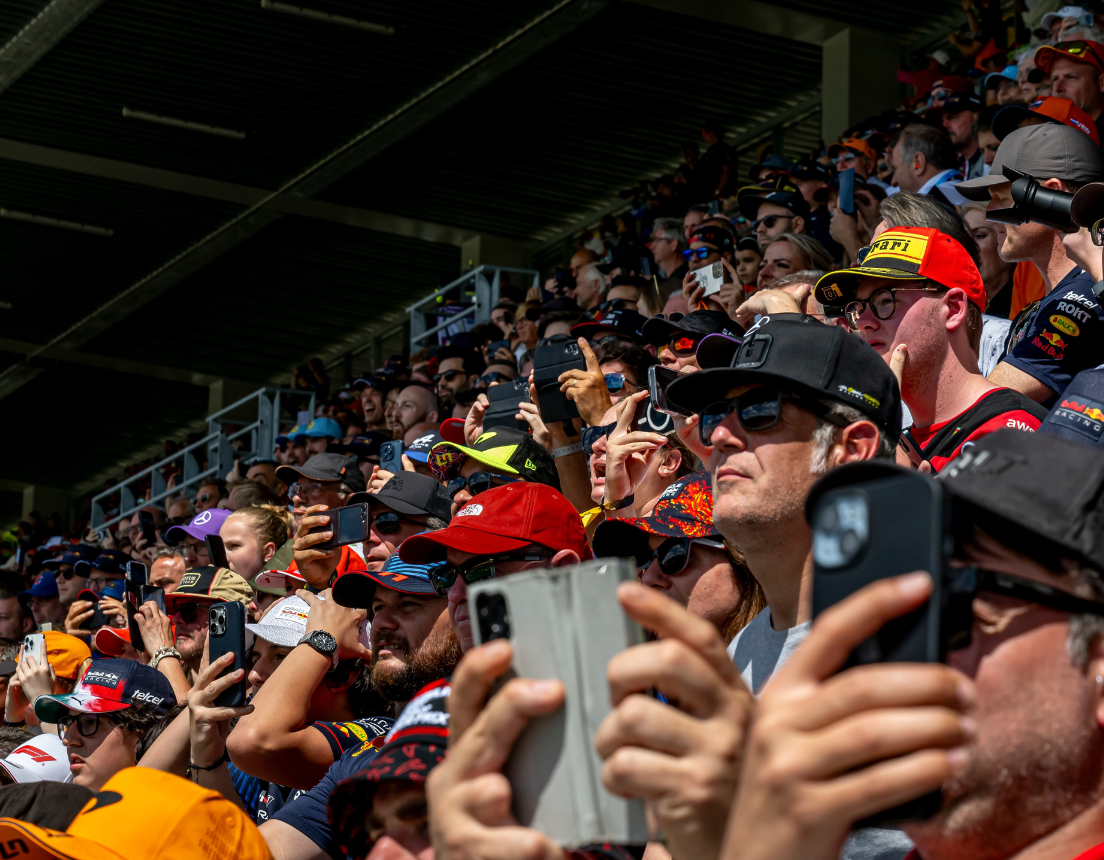 Fans at sporting even taking pictures on their phones.